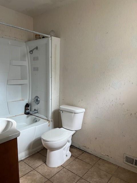 full bathroom with tile patterned flooring, vanity, shower / bathing tub combination, and toilet