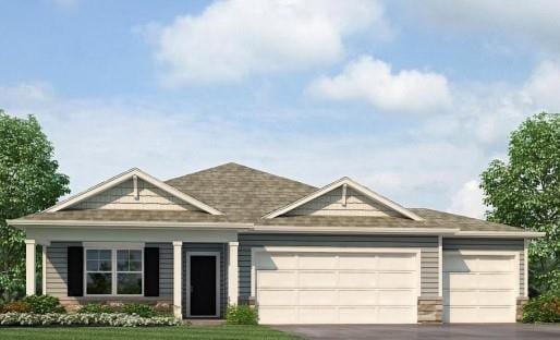 view of front of house with a garage and a front lawn