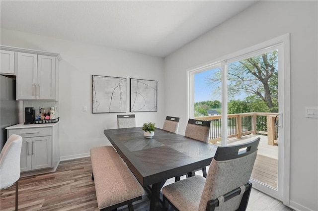 605 Izzy Way, Liberty, MO 64068 - dining area featuring light wood-type flooring and baseboards