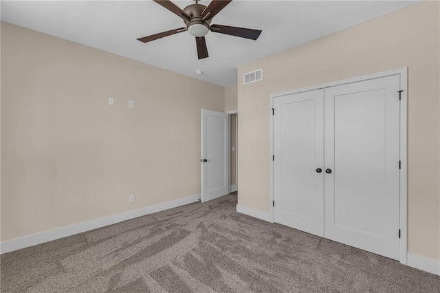 1111 Old Time Dr, Excelsior Springs, MO 64024 - unfurnished bedroom featuring baseboards, visible vents, carpet floors, and a closet