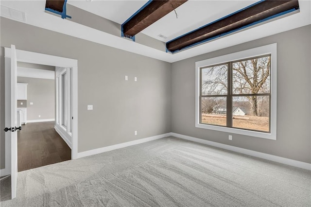 1112 Old Time Dr, Excelsior Springs, MO 64024 - empty room with beamed ceiling, baseboards, carpet, and visible vents