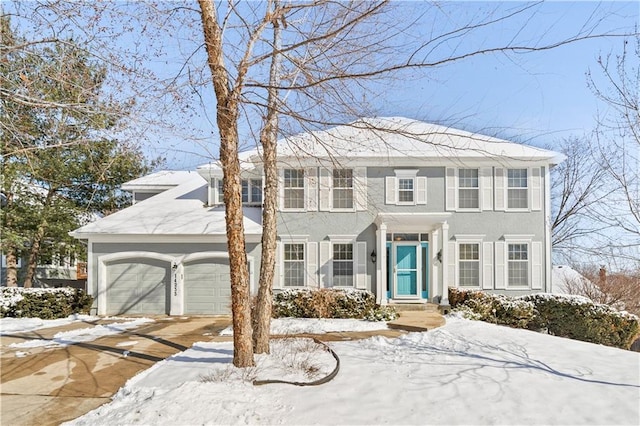 view of front of property with a garage