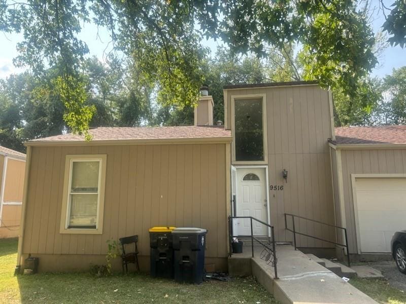 exterior space featuring a garage