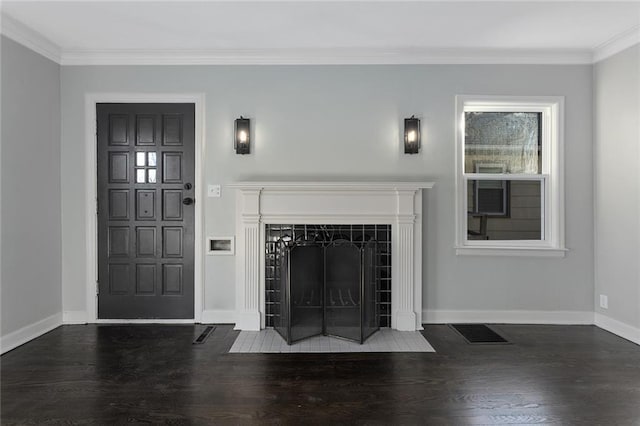 unfurnished living room featuring a fireplace, ornamental molding, and dark hardwood / wood-style flooring