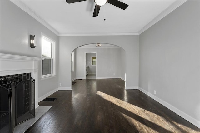 unfurnished living room with ornamental molding, ceiling fan, and dark hardwood / wood-style flooring