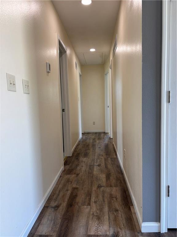 1202 NW County Road 6001, Butler, MO 64730 - corridor featuring attic access, wood finished floors, recessed lighting, and baseboards