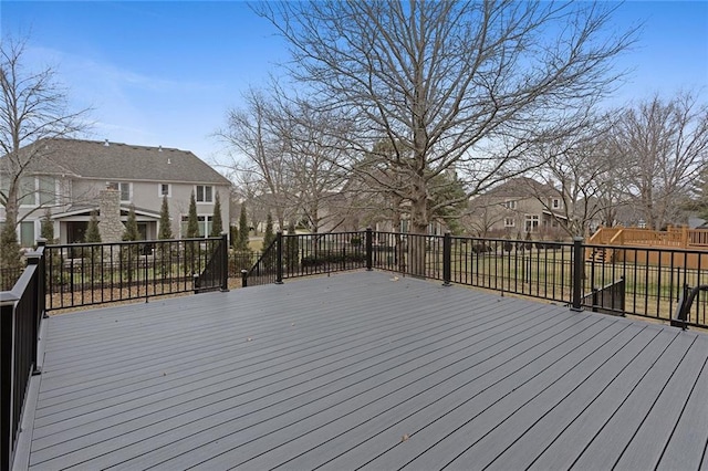 wooden deck with a residential view