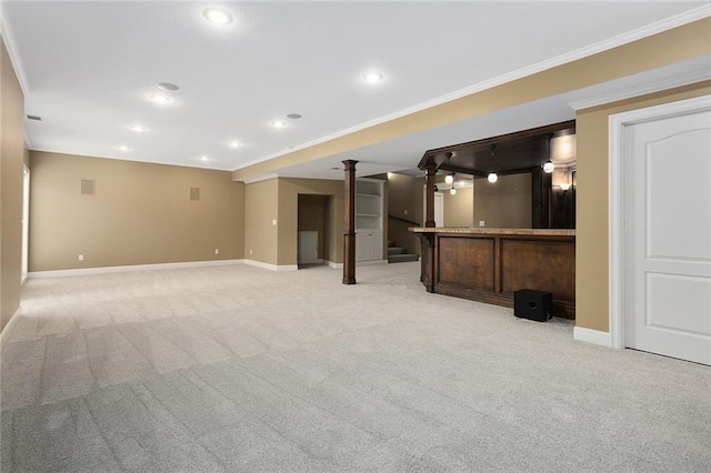 unfurnished living room with light carpet, recessed lighting, baseboards, and ornamental molding