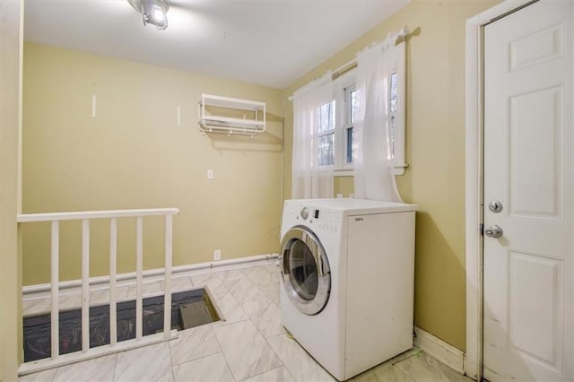 washroom featuring washer / dryer