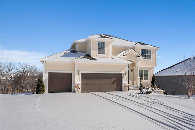 view of front of house with a garage