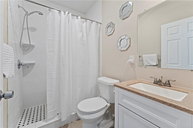 bathroom with vanity, a shower with curtain, and toilet