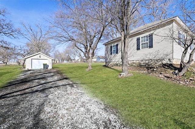 view of side of home with a garage, an outdoor structure, and a lawn