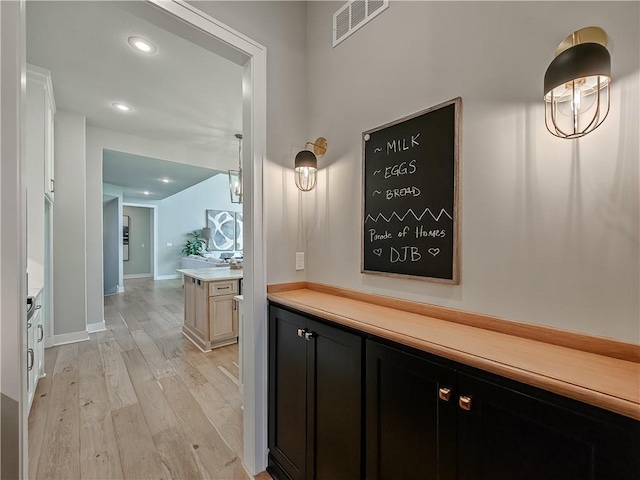 hall featuring light hardwood / wood-style floors