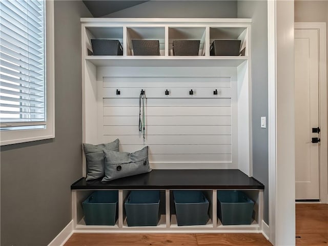 mudroom with light hardwood / wood-style floors