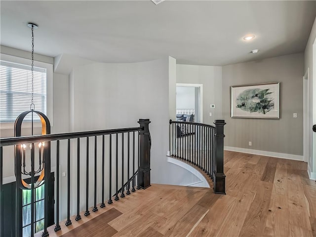 stairs with wood-type flooring