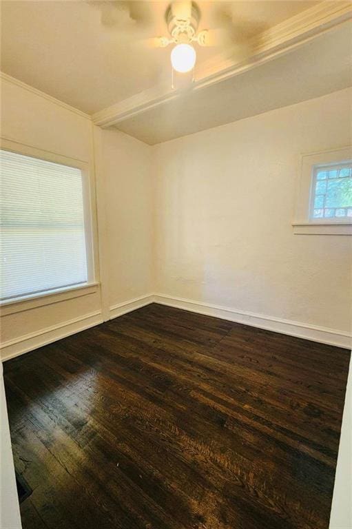 empty room featuring hardwood / wood-style flooring and ceiling fan