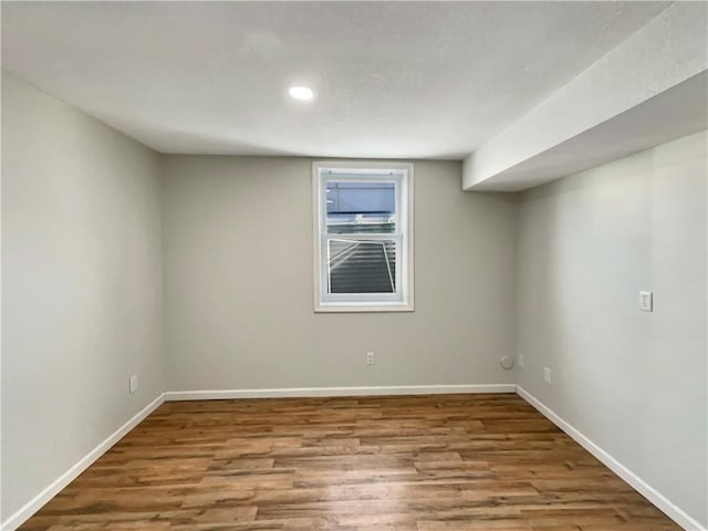 spare room with light hardwood / wood-style floors