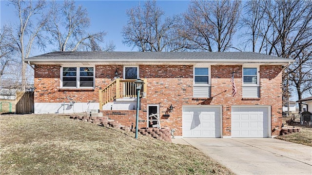 view of front of home featuring a garage, driveway, and brick siding