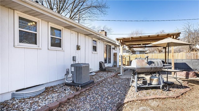 view of patio / terrace featuring a fenced backyard and central AC