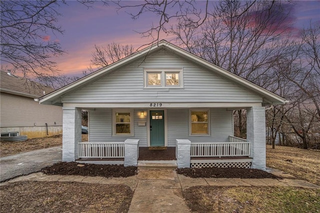 bungalow-style home featuring covered porch