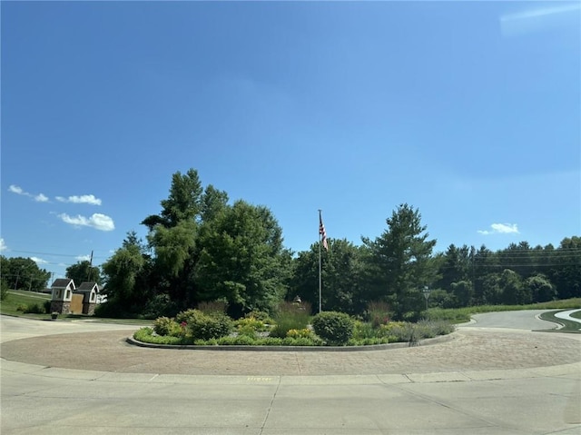 4909 S Creek Woods Dr, Saint Joseph, MO 64507 - view of concrete road with curbs