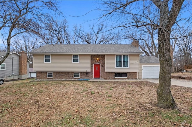 bi-level home featuring a garage