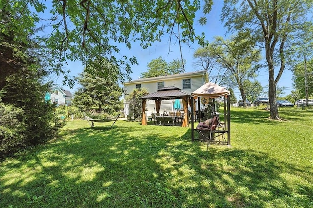 746 Salem Rd, Excelsior Springs, MO 64024 - back of house featuring a gazebo and a yard