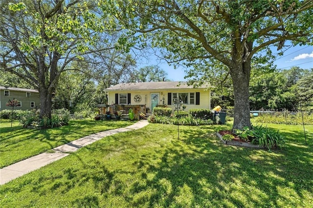 746 Salem Rd, Excelsior Springs, MO 64024 - ranch-style house with a deck and a front yard