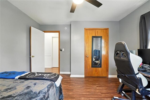 746 Salem Rd, Excelsior Springs, MO 64024 - bedroom featuring wood finished floors, ceiling fan, and an office area