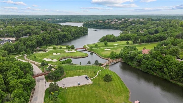 24982 W 106th Ct, Olathe, KS 66061 - aerial view of property's location featuring a large body of water, a local golf course, and a heavily wooded area
