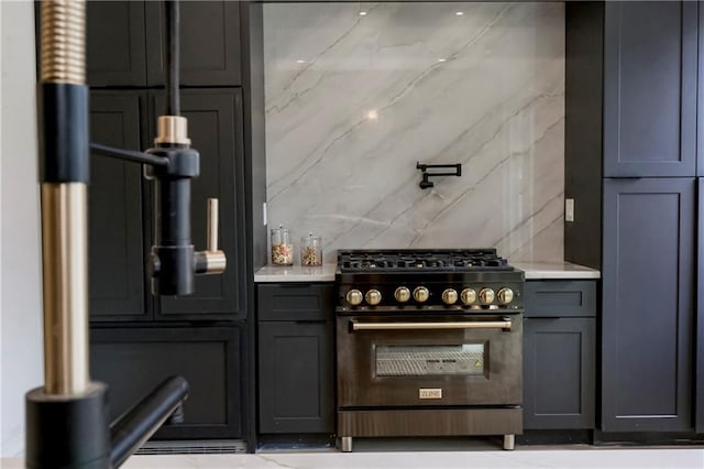 interior space featuring stainless steel gas stove and decorative backsplash