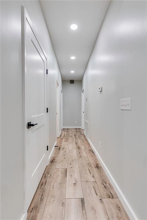 hall featuring light hardwood / wood-style flooring