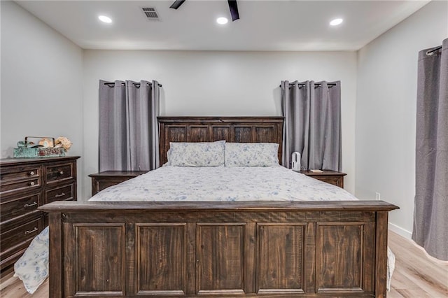 bedroom featuring ceiling fan and light wood-type flooring