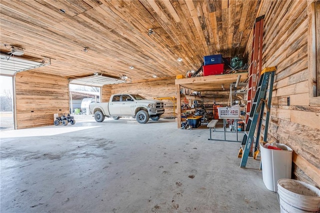 garage with wooden walls and wooden ceiling