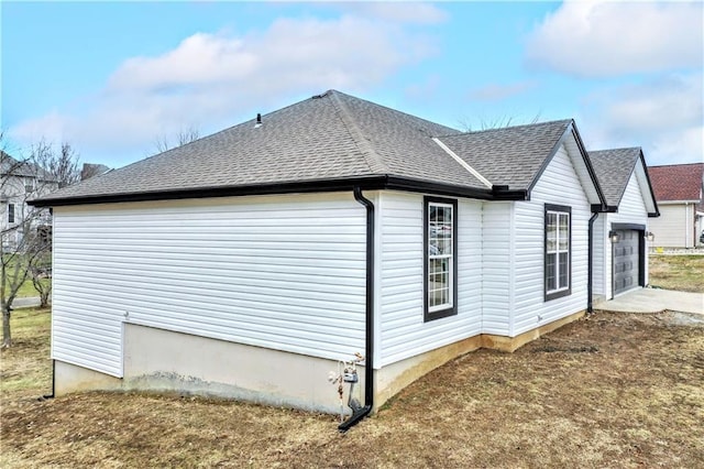 view of home's exterior with a garage