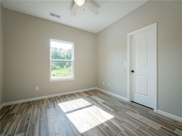 unfurnished room featuring ceiling fan