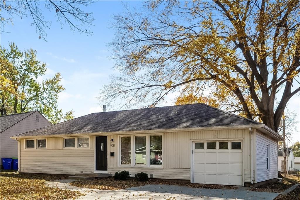 single story home with a garage