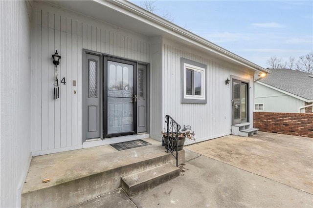 property entrance with a patio