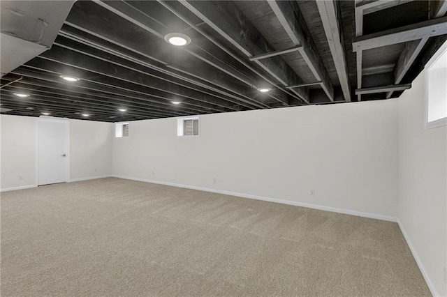 basement with carpet floors