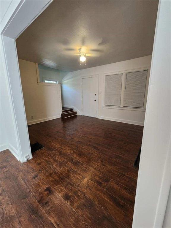 interior space featuring dark wood-type flooring