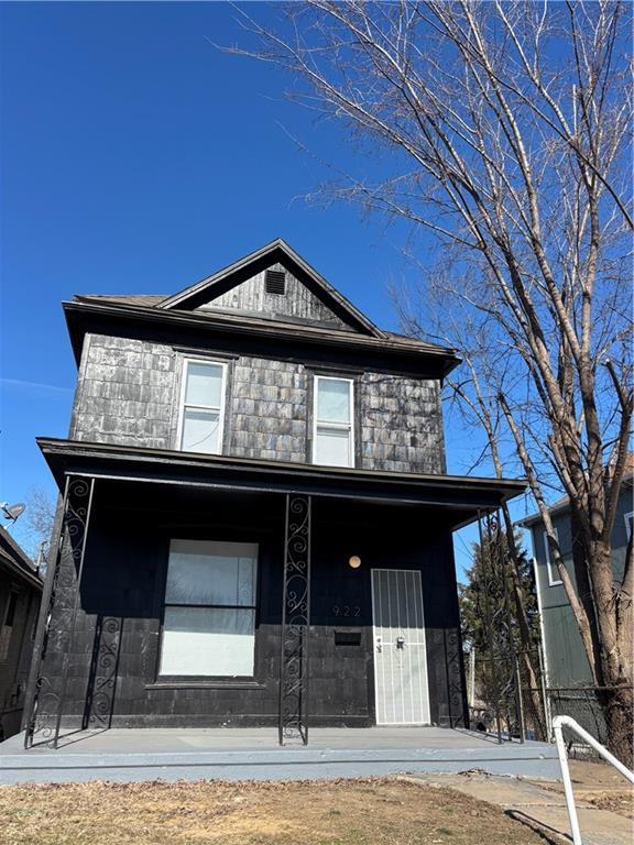 view of property with covered porch