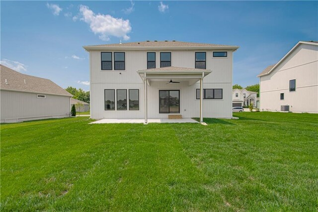 2327 Fishing Ln, Kearney, MO 64060 - back of house with a ceiling fan, a patio, a lawn, and central AC unit