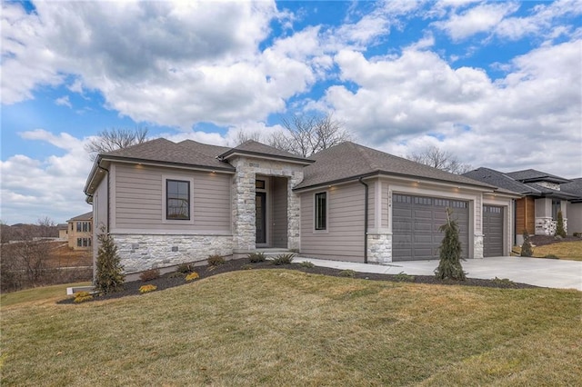 prairie-style home with a garage and a front yard