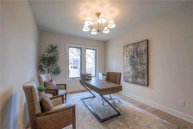 office area featuring a notable chandelier and hardwood / wood-style flooring