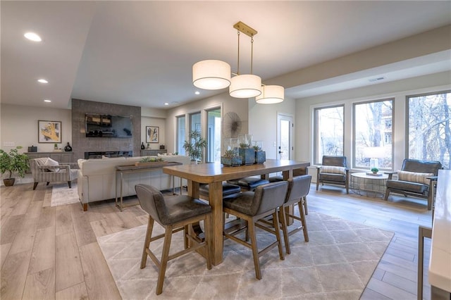 dining area with light hardwood / wood-style flooring