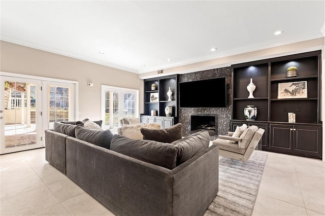 living room featuring light tile patterned floors, ornamental molding, a fireplace, and recessed lighting