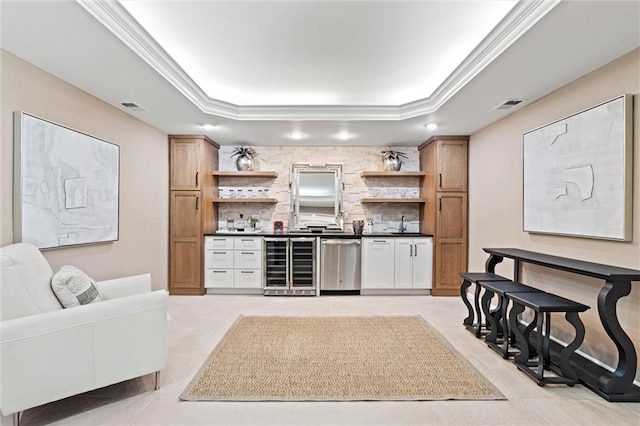 bar with a raised ceiling, visible vents, beverage cooler, and dishwasher