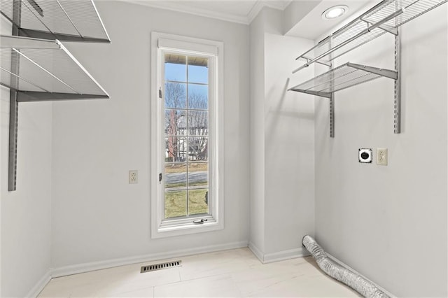 4101 W 123rd St, Leawood, KS 66209 - laundry room with electric dryer hookup, ornamental molding, and baseboards