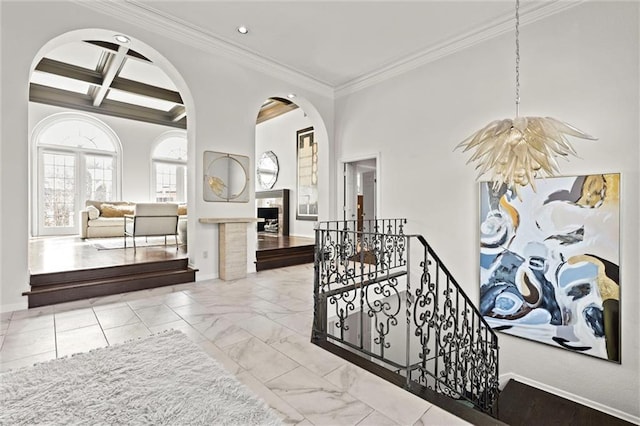 4101 W 123rd St, Leawood, KS 66209 - hall featuring an upstairs landing, arched walkways, crown molding, beamed ceiling, and marble finish flooring