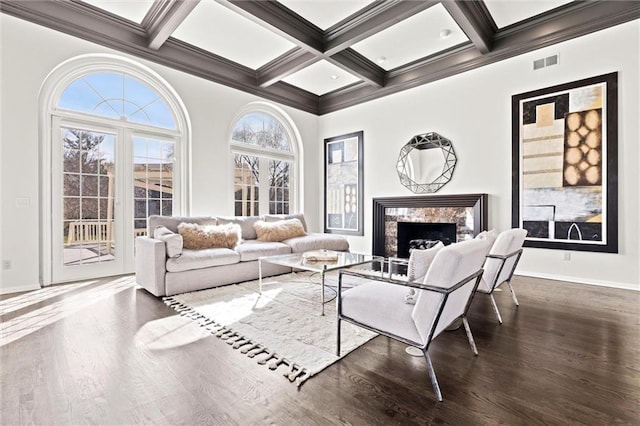 4101 W 123rd St, Leawood, KS 66209 - living area with wood finished floors, beam ceiling, coffered ceiling, a fireplace, and crown molding